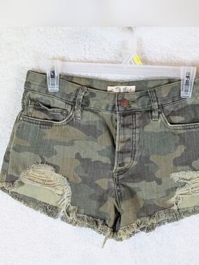 370-We The Free Olive Camo Frayed Denim Shorts